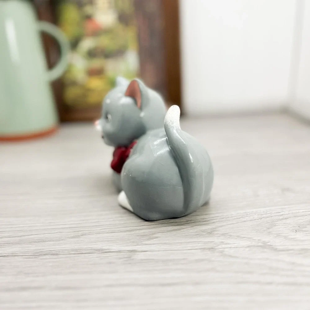 Vintage Gray Porcelain Cat Figure with Red Bow